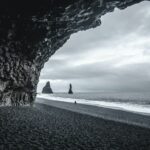 Black Sand Beach Tour, seen from the cave at Reynisfjara black sand beach, Hálsanefshellir cave on Reynisfjara black sand beach