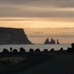 Black Sand Beach Tour, Kirkjufjara black sand beach and Eagle Rock in south Iceland with views over to Reynisfjara and Reynisdrangar