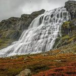 two people standing in front of Dynjandi Westfjords Iceland, Cruise ship tour to Dynjandi waterfall, Isafjordur cruise tour, Isafjordur shore excursion