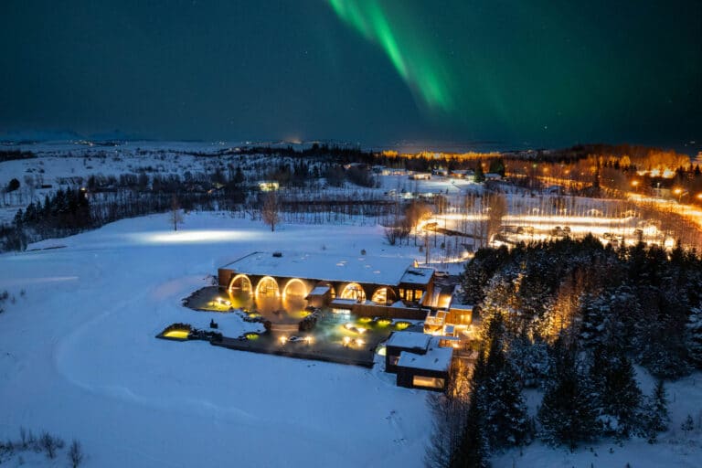 northern lights at Laugaras lagoon new geothermal baths in Iceland