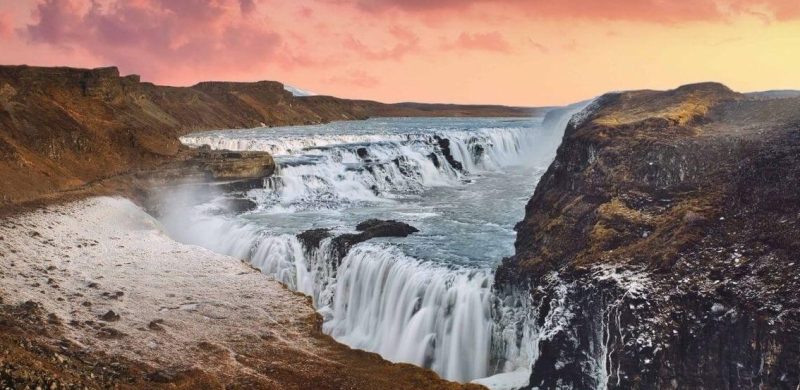 Iceland Must See - Sunset at Gullfoss waterfall in Golden Circle Iceland, midnight sun at Gullfoss
