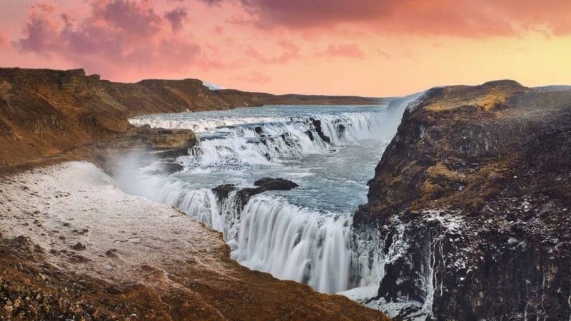 Iceland Must See - Sunset at Gullfoss waterfall in Golden Circle Iceland, midnight sun at Gullfoss